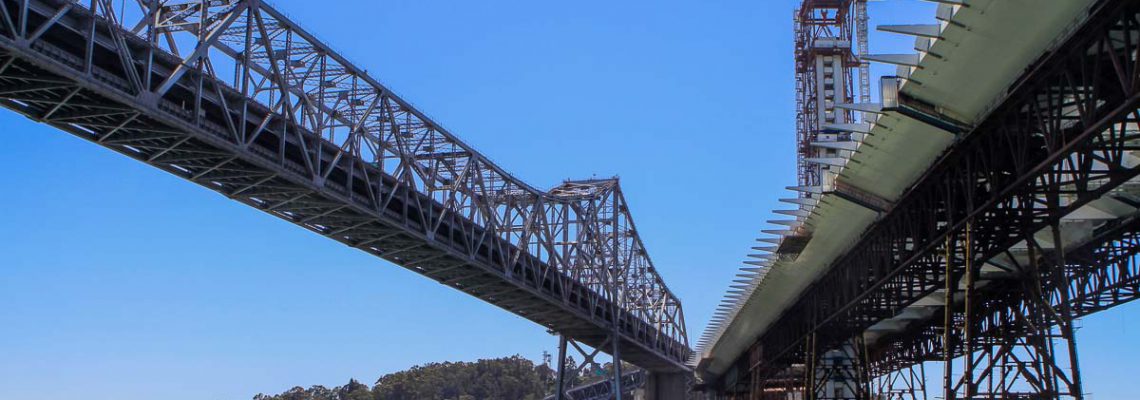 old bay bridge next to self-anchored suspension bridge construction