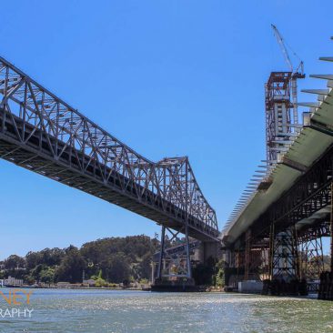 old bay bridge next to self-anchored suspension bridge construction