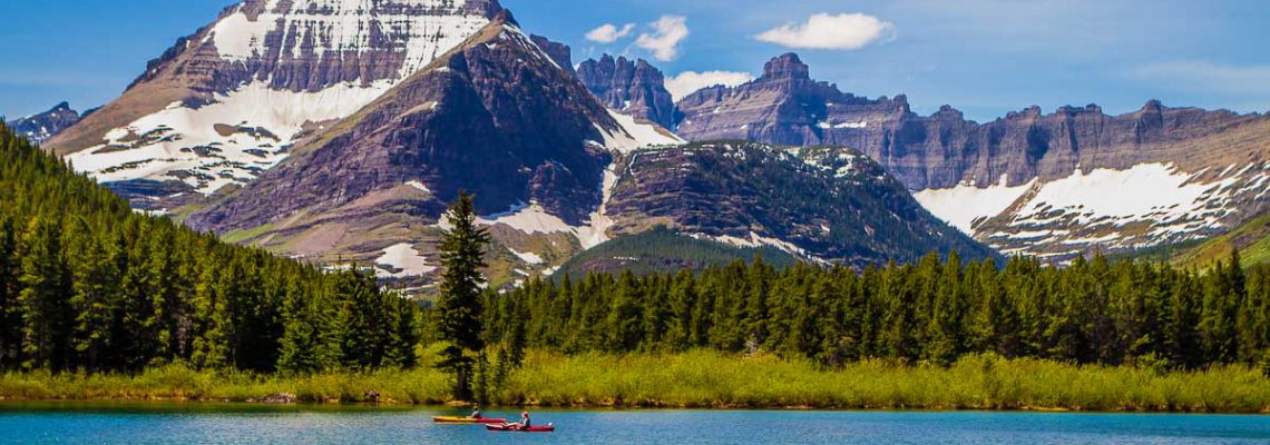 kayakers swiftcurrent lake glacier national park montana