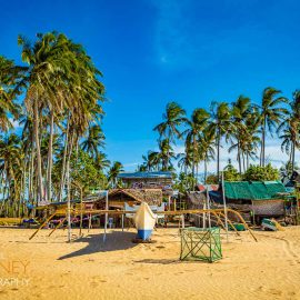 boat beach palm tree maintenance repair nacpan beach el nido palawan philippines